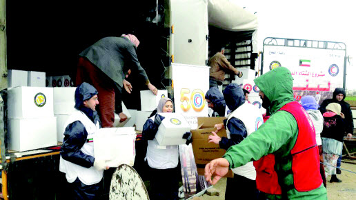 «الهلال الأحمر» الكويتي توزع مساعدات إنسانية على نازحين سوريين في البقاع 